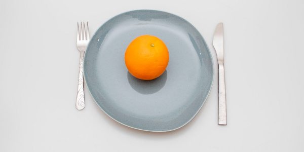 a few oranges on a plate
